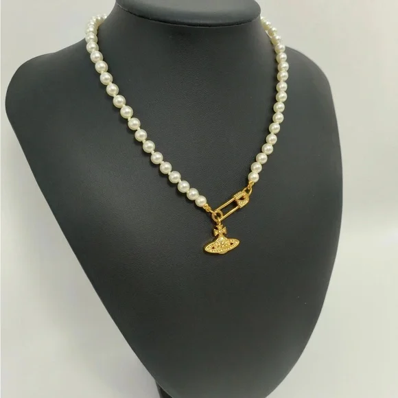 Vivienne Westwood Pearl Necklace with Gold Brooch Pendant